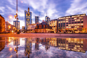 Reflections in Frankfurt am Main. Great reflection in puddles. The city, skyscrapers and streets...