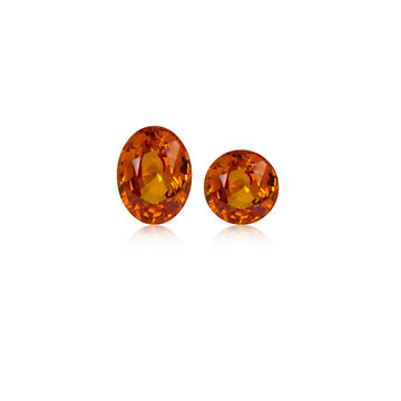 gemstone yellow sapphire oval and round cut isolated on white background