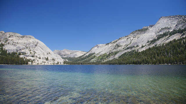 Tranquil blue waters of Tenaya Lake in Yosemite National Park