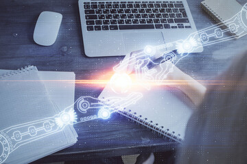 Multi exposure of writing hands on background with data solution hologram. Technology concept.