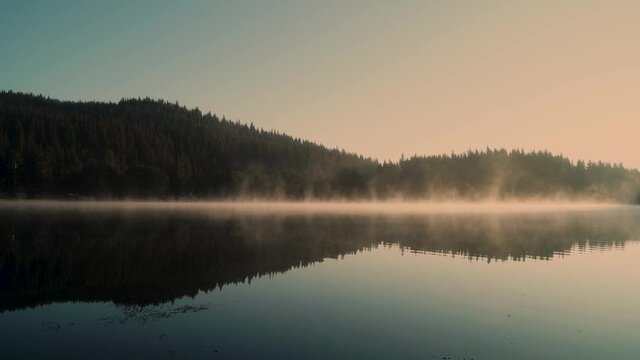 Morning fumes in a mountain lake, Bulgaria, Shiroka Polyana dam