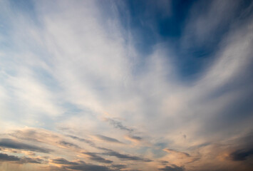 Clouds at sunset, amazing sky, nature background.