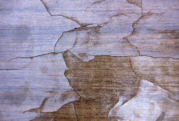 Texture of varnish with cracks on wooden furniture