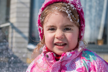 Close up Portrait of cute little girl in winter