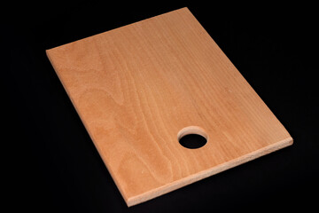 Wooden cutting board on darck background