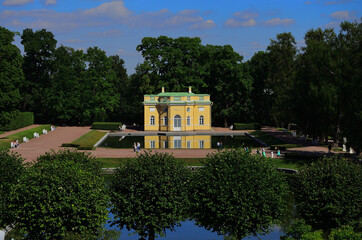 View of the Upper Bath with a pond in the mezeum of the Tsarskoe Selo nature reserve. Tourists...