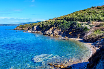 Blue shores and immaculate sea water near mountains in Nea Roda