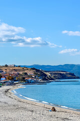 Obraz premium Village and port by the sea in Nea Roda, Halkidiki, Greece