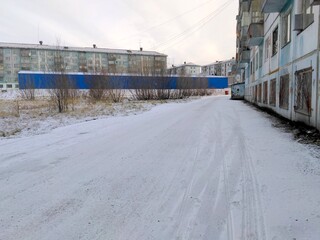 snowy streets warm winter Northern Russia landscape during the day