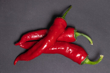 Healthy food. Fresh vegetables. Peppers on a darck background.