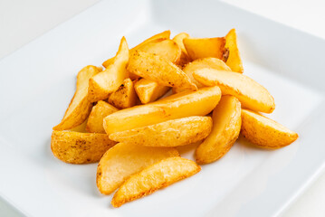 baked potatoes on the white plate