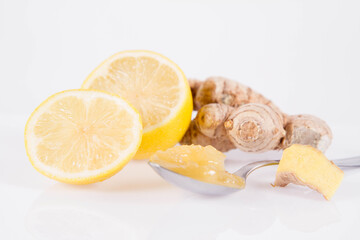 Honey, lemon and ginger on a white background