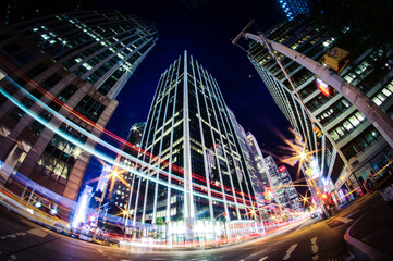 Fototapeta na wymiar Skyscraper at night in New York City, fisheye lens