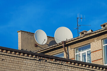 Antennas on roof of old house