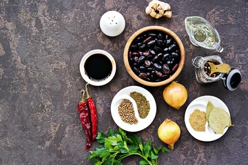 Obraz na płótnie Canvas Ingredients for making red bean lobio. Georgian cuisine. Recipes for vegetarians.