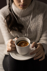 Girl holding a cup of tea