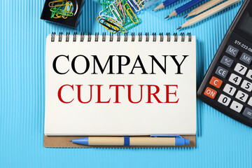 company culture, text on white paper on a blue background