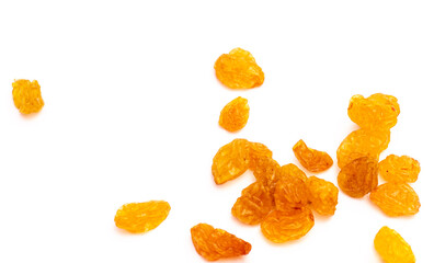 A handful of yellow raisins on a white background