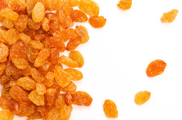 Appetizing yellow raisins on a white background, place for text