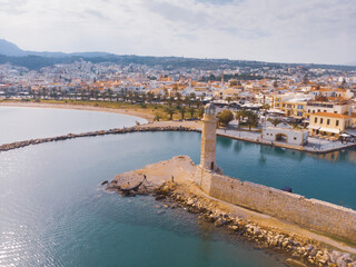 Naklejka premium Aerial view of port entrance and city of Rethymon 