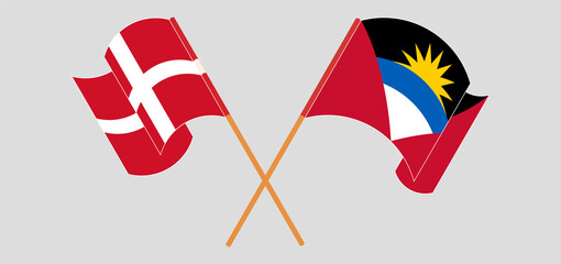Crossed flags of Antigua and Barbuda and Denmark