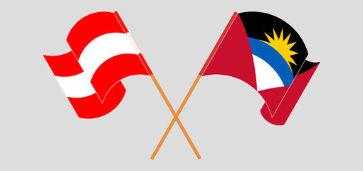 Crossed flags of Antigua and Barbuda and Austria