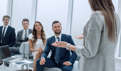 business woman makes a report for the business team