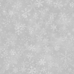Fototapeta na wymiar Christmas seamless pattern of snowflakes of different shapes, sizes and transparency, on gray background