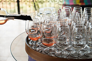 Wine glasses display at winery. Close up, copy space, background.