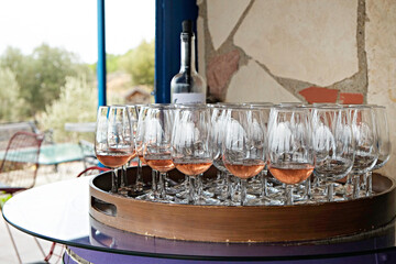 Wine glasses display at winery. Close up, copy space, background.