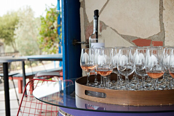 Wine glasses display at winery. Close up, copy space, background.