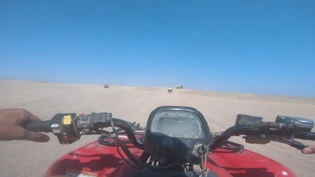 ATVs Drive Through Desert, pov