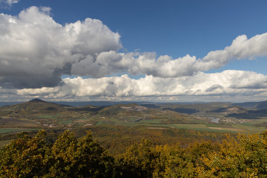 Autumn nature view from mountain Lovos to the horizon with hills and mountains and cloudy sky