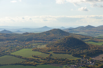 Autumn nature view from mountain Lovos to the horizon with hills and mountains and cloudy sky