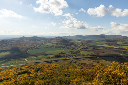 Autumn nature view from mountain Lovos to the horizon with hills and mountains and cloudy sky over highway