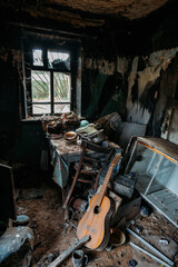 Burnt old house interior. Consequences of fire