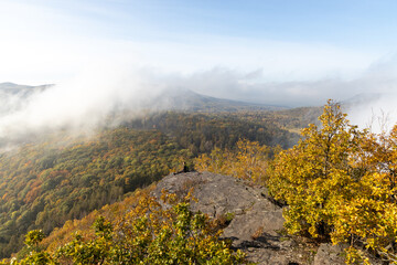 Obraz premium Autumn mountains with clouds in valley