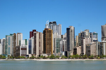 Fototapeta na wymiar City view of Balneario Camboriu, Santa Catarina, Brazil and sky blue