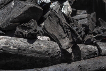 Black charcoal texture background.selective focus