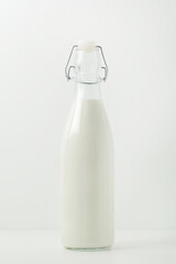 A glass bottle filled with milk