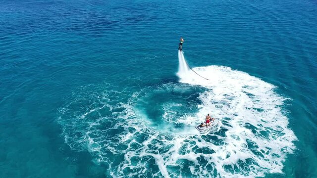 Fly boarding and sea riding in a sunny summer day, Zakynthos, Greece
