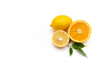 halves of lemon and orange on a white background
