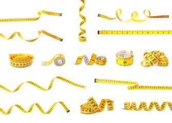 Set of yellow measuring tapes on white background