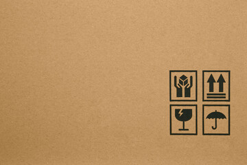 Black fragile symbol on cardboard box
