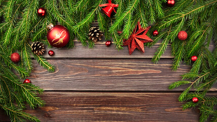 Fototapeta na wymiar Winter holidays banner with fir tree branches and christmas decorations