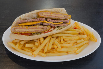 Cordon Bleu Steak sandwich and fries