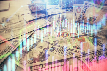 Multi exposure of forex chart drawing over us dollars bill background. Concept of financial success markets.