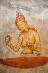 Fototapeta na wymiar Sigiriya frescoes mural paintings sheltered gallery on Sigiriya rock fortress, Sri Lanka.