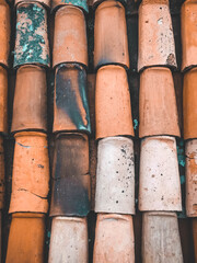 Diverse roof tiles each having its own story to tell. Closeup top view