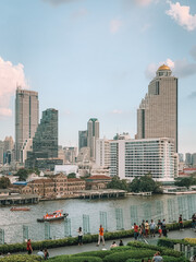 View of buildings along the Chao Phraya River, from IconSiam, in Bangkok, Thailand